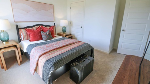 The Rhett plan is a well-designed single-level layout with 4 bedrooms and 2 bathrooms, encompassing 1,774 square feet for practical living. One standout feature of the Rhett plan is the seamless integration of the kitchen, breakfast area, and great room in an open concept layout, which is perfect for hosting guests. The kitchen is equipped with granite countertops, stainless steel appliances, and a pantry for added convenience and modern style. The spacious Living Area features trey ceilings and leads to a shaded covered patio, creating a welcoming space for relaxation and entertaining. Bedroom One suite offers a private retreat with trey ceilings, a luxurious shower, separate garden tub, double marble vanity, private water closet, and a large walk-in closet for added comfort and luxury. For convenience and storage, the plan includes a two-car garage and a laundry room. In addition to Bedroom One suite, there are 3 other bedrooms and another full bathroom, providing ample space for family and guests. Furthermore, the home comes with a one-year builder's warranty, ensuring peace of mind for the new homeowners. Furthermore, every home is accompanied by a one-year builder's warranty to provide you with added peace of mind. It's important to note that our smart home technology package is included as part of your new home. The Smart Home Technology Package we offer is designed for effortless use and provides unmatched convenience, allowing you to easily control various essential features with just a simple touch. Some of the features of this package include lighting automation, an IQ panel, a video doorbell, keyless front door entry, and the ability to manage the temperature from the comfort of your phone. Give us a call and schedule your personal guided tour of the Rhett today!
