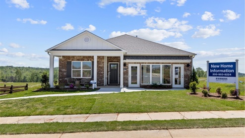 The Rhett plan is a well-designed single-level layout with 4 bedrooms and 2 bathrooms, encompassing 1,774 square feet for practical living. One standout feature of the Rhett plan is the seamless integration of the kitchen, breakfast area, and great room in an open concept layout, which is perfect for hosting guests. The kitchen is equipped with granite countertops, stainless steel appliances, and a pantry for added convenience and modern style. The spacious Living Area features trey ceilings and leads to a shaded covered patio, creating a welcoming space for relaxation and entertaining. Bedroom One suite offers a private retreat with trey ceilings, a luxurious shower, separate garden tub, double marble vanity, private water closet, and a large walk-in closet for added comfort and luxury. For convenience and storage, the plan includes a two-car garage and a laundry room. In addition to Bedroom One suite, there are 3 other bedrooms and another full bathroom, providing ample space for family and guests. Furthermore, the home comes with a one-year builder's warranty, ensuring peace of mind for the new homeowners. Furthermore, every home is accompanied by a one-year builder's warranty to provide you with added peace of mind. It's important to note that our smart home technology package is included as part of your new home. The Smart Home Technology Package we offer is designed for effortless use and provides unmatched convenience, allowing you to easily control various essential features with just a simple touch. Some of the features of this package include lighting automation, an IQ panel, a video doorbell, keyless front door entry, and the ability to manage the temperature from the comfort of your phone. Give us a call and schedule your personal guided tour of the Rhett today!