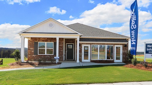 The Rhett plan is a well-designed single-level layout with 4 bedrooms and 2 bathrooms, encompassing 1,774 square feet for practical living. One standout feature of the Rhett plan is the seamless integration of the kitchen, breakfast area, and great room in an open concept layout, which is perfect for hosting guests. The kitchen is equipped with granite countertops, stainless steel appliances, and a pantry for added convenience and modern style. The spacious Living Area features trey ceilings and leads to a shaded covered patio, creating a welcoming space for relaxation and entertaining. Bedroom One suite offers a private retreat with trey ceilings, a luxurious shower, separate garden tub, double marble vanity, private water closet, and a large walk-in closet for added comfort and luxury. For convenience and storage, the plan includes a two-car garage and a laundry room. In addition to Bedroom One suite, there are 3 other bedrooms and another full bathroom, providing ample space for family and guests. Furthermore, the home comes with a one-year builder's warranty, ensuring peace of mind for the new homeowners. Furthermore, every home is accompanied by a one-year builder's warranty to provide you with added peace of mind. It's important to note that our smart home technology package is included as part of your new home. The Smart Home Technology Package we offer is designed for effortless use and provides unmatched convenience, allowing you to easily control various essential features with just a simple touch. Some of the features of this package include lighting automation, an IQ panel, a video doorbell, keyless front door entry, and the ability to manage the temperature from the comfort of your phone. Give us a call and schedule your personal guided tour of the Rhett today!