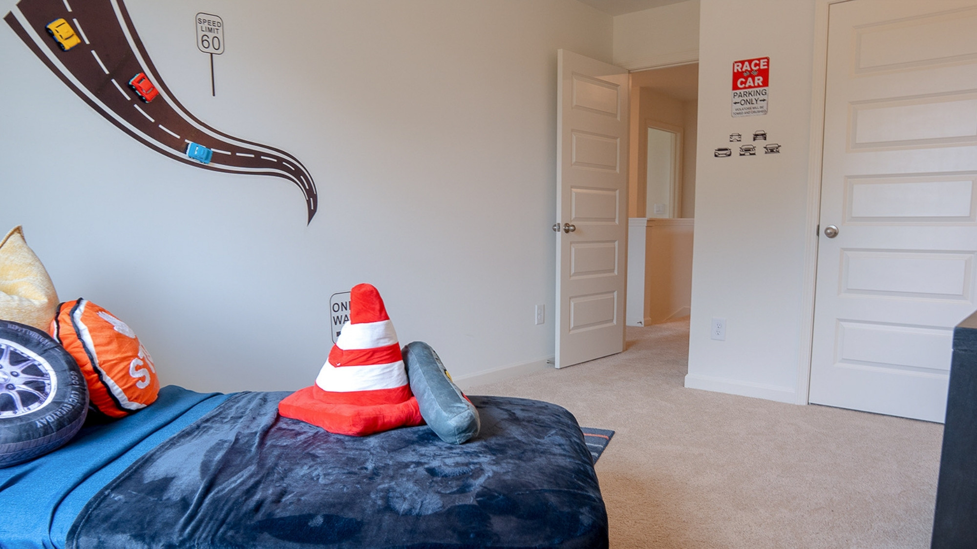 The third bedroom is also spacious and has ample room for a queen bed and two nightstands.