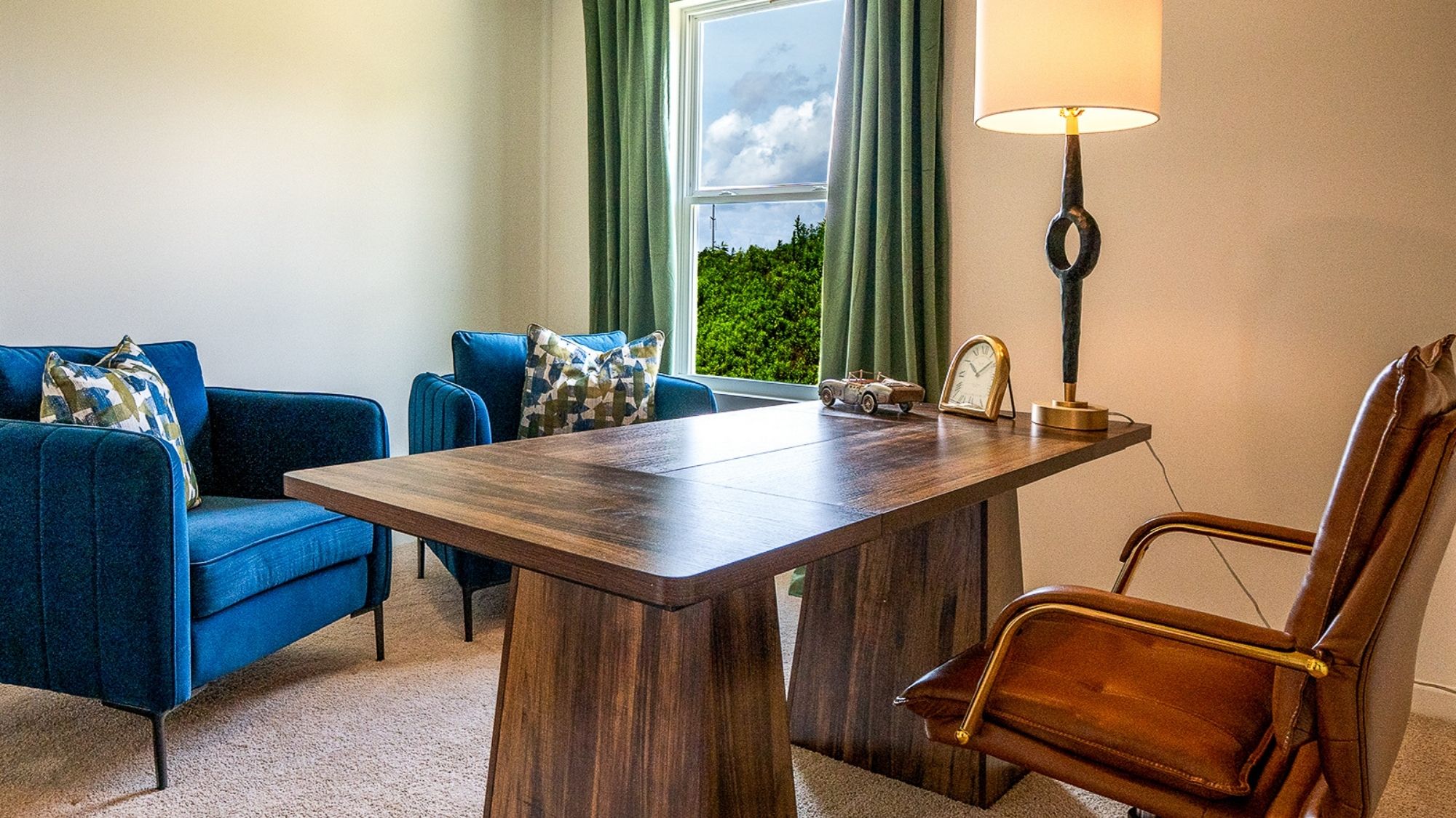 The third bedroom is also spacious and has ample room for a queen bed and two nightstands.