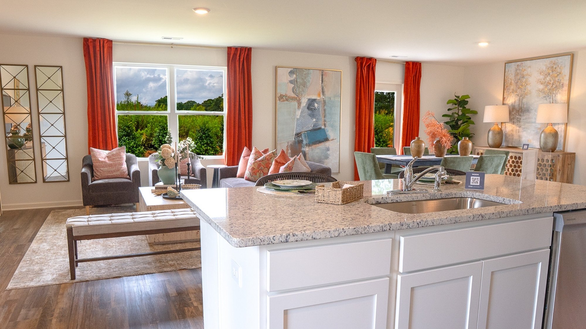 Another large window allows ample sunlight to stream into the kitchen.
