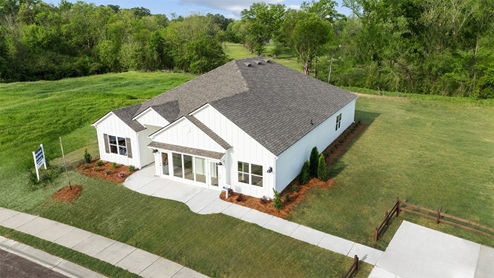 Welcome to the Destin Plan, a beautiful 4 bed, 3 bath home with a spacious covered patio and a 3-car garage – all on one level. Sitting just under 2,300square feet, this home offers a large breakfast nook, a separate dining area, and a large living area making a very comfortable open design for easy entertaining. In the kitchen, you will find a large island bar and a corner pantry. As you enter the home, you are met with an inviting open floor plan with direct access to your living, dining and kitchen areas, a full guest bathroom, and the 2nd and 3rd secondary bedrooms. Immediately on either side you will have access to your three-car garage, perfect for multiple vehicles, and storage. Privately tucked away in this area is also the additional 4th bedroom, ideal for guest stays or a private office. Opposite the back end of the home will be your spacious, luxurious primary bedroom with full access to a walk-in closet, a large primary bathroom hosting a double vanity, tub and a shower. Coming back to the center of the home, you will find the stunning open layout of the living area and beautiful kitchen. The kitchen includes granite countertops, stainless steel appliances, stylish shaker cabinetry, and a center island perfect for additional seating. With natural light and nearby covered patio access, the living and dining area are integrated perfectly to complete this relaxing atmosphere. Enjoy easy maintenance in your home with our luxury vinyl plank flooring. In addition to all the features and amenities our Destin Plan offers, each home is built with our Smart Home technology package, designed to bring the ease and convenience of life right to your fingertips. As a most popular favorite, this plan is ideal for any size family. Call to schedule your personal guided tour of the Destin today!
