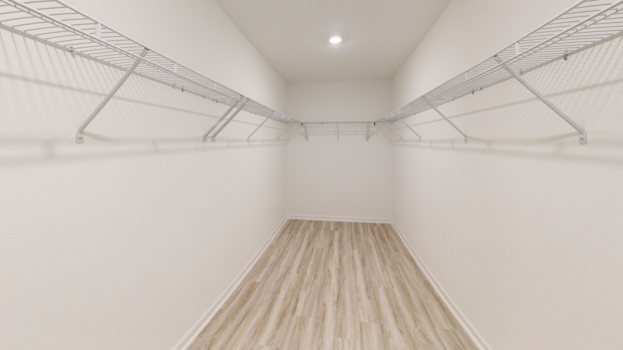 The large walk in closet off of the primary bedroom.