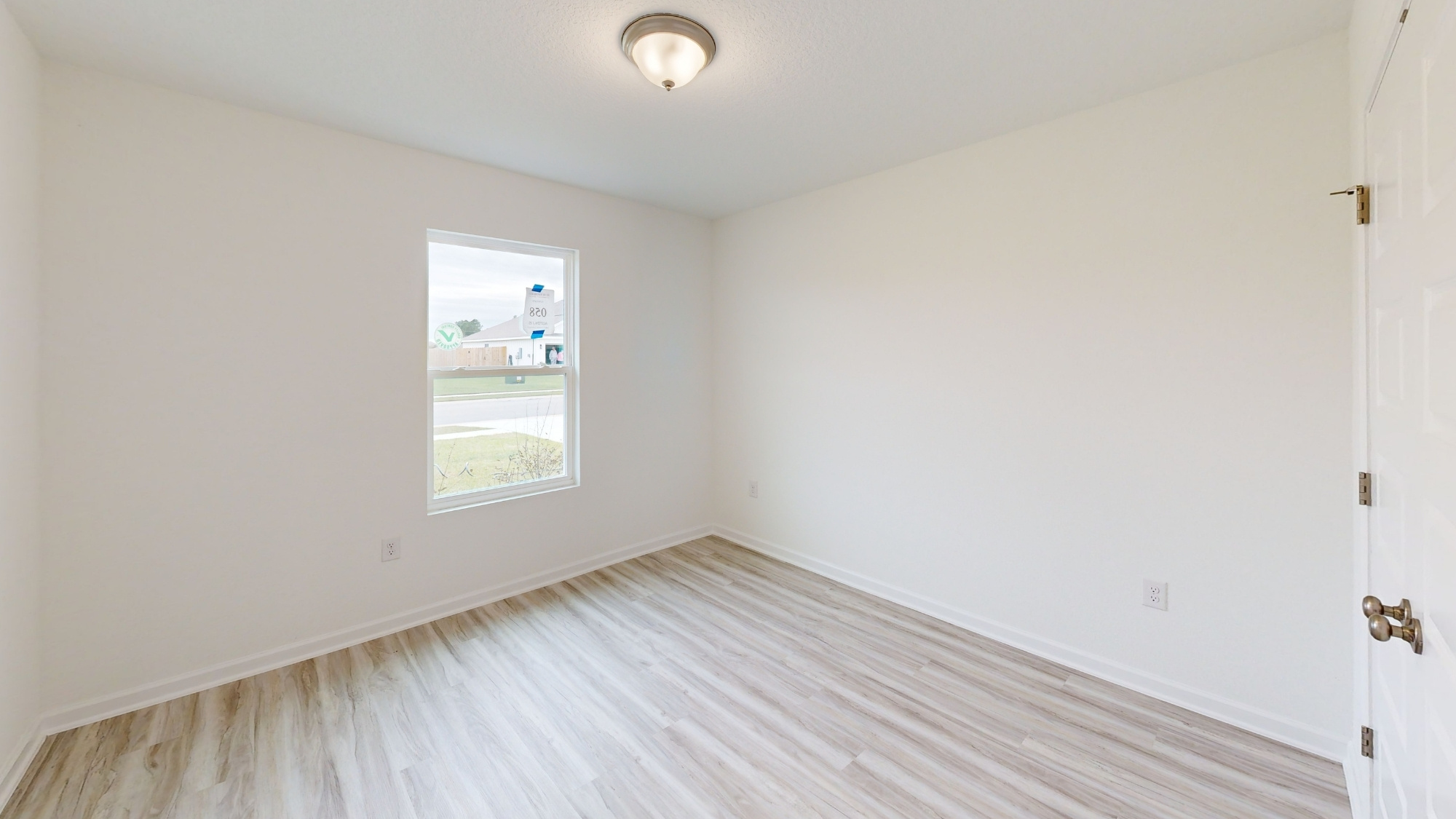 The front bedrooms feature a large closet and a big window, allowing lots of natural light to stream into the space.