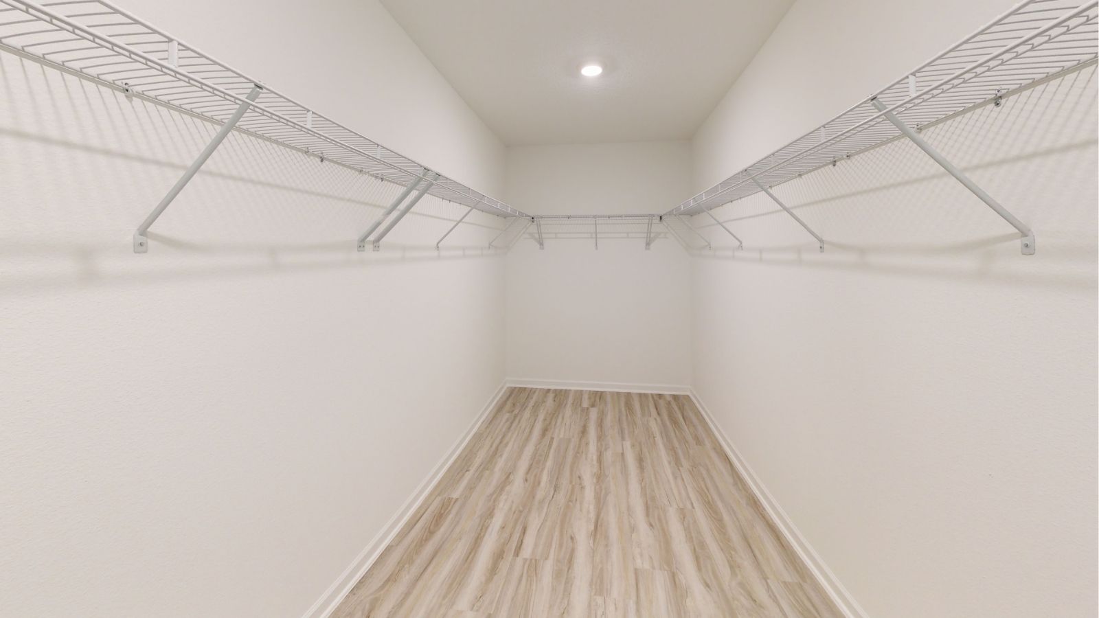 The Alston plan is a brand new single-level layout with 3 bedrooms, 2 bathrooms, and offers 1,734 square feet of living space. One standout feature of the Rhett plan is the seamless integration of the kitchen, breakfast area, and a dining area open concept layout, with direct access to a covered porch area. The kitchen is equipped with granite countertops, stainless steel appliances, and a pantry for added convenience and modern style. The Alston offers some luxurious convenience while priced for our express style plans.   The living area offers the wide open style that leads to a shaded covered patio, creating a welcoming space for relaxation and entertaining. Bedroom One suite offers a large walk in closet area, a gorgeous double vanity, and convenient access to the living area for added comfort and luxury. For convenience and storage, the plan includes a two-car garage and a laundry room. In addition to Bedroom One suite, there are 2 other bedrooms and another full bathroom, providing ample space for family and guests. Furthermore, the home comes with a one-year builder's warranty, ensuring peace of mind for the new homeowners.   Furthermore, every home is accompanied by a one-year builder's warranty to provide you with added peace of mind. It's important to note that our smart home technology package is included as part of your new home. The Smart Home Technology Package we offer is designed for effortless use and provides unmatched convenience, allowing you to easily control various essential features with just a simple touch. Some of the features of this package include lighting automation, an IQ panel, a video doorbell, keyless front door entry, and the ability to manage the temperature from the comfort of your phone. Give us a call and schedule your personal guided tour of the Alston today!