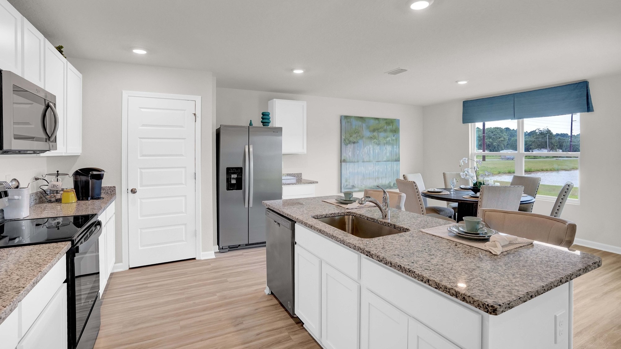 The dining area opens up into the kitchen, making it a perfect space for entertaining.