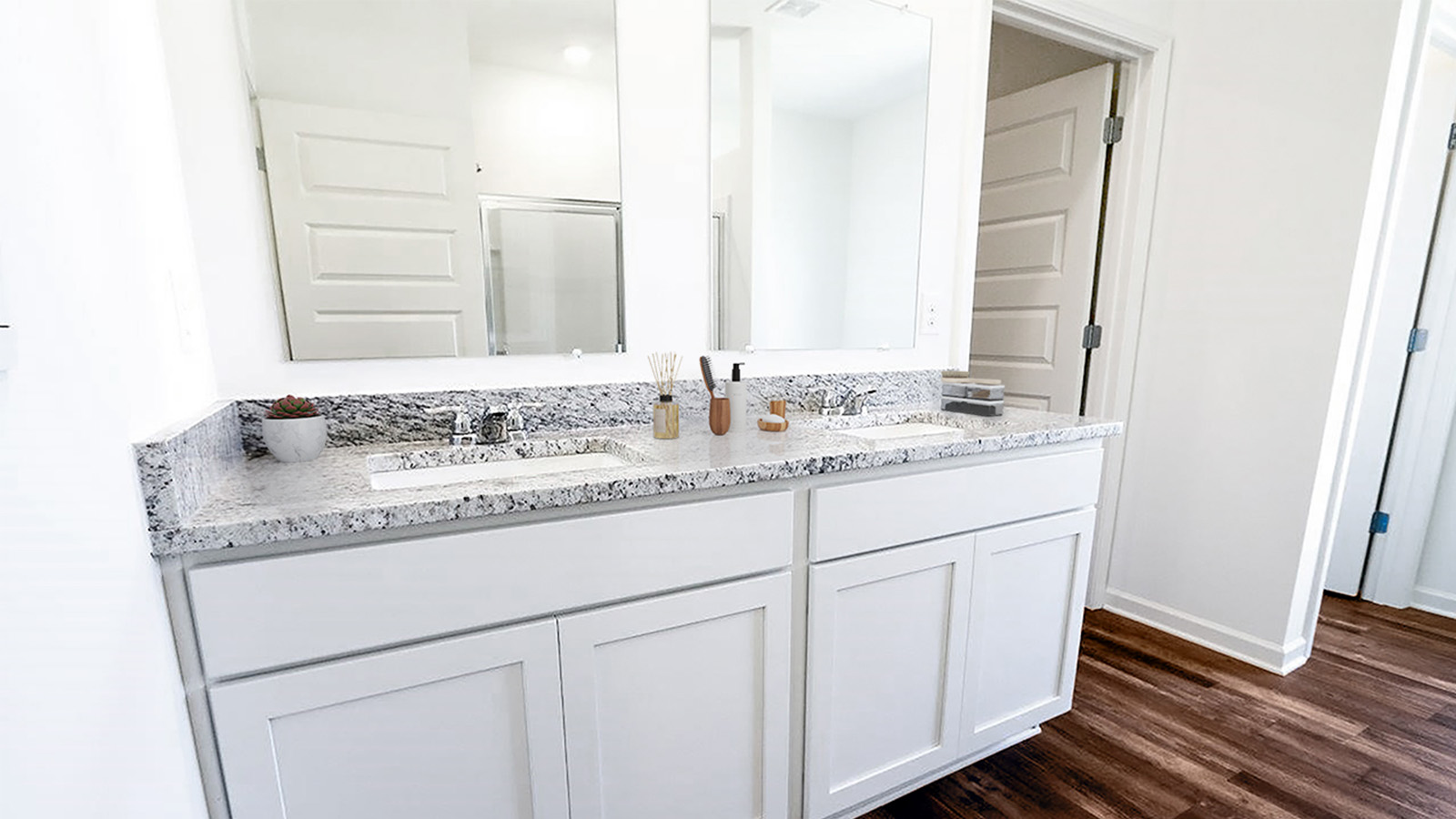 The primary bathroom also has a large double vanity.