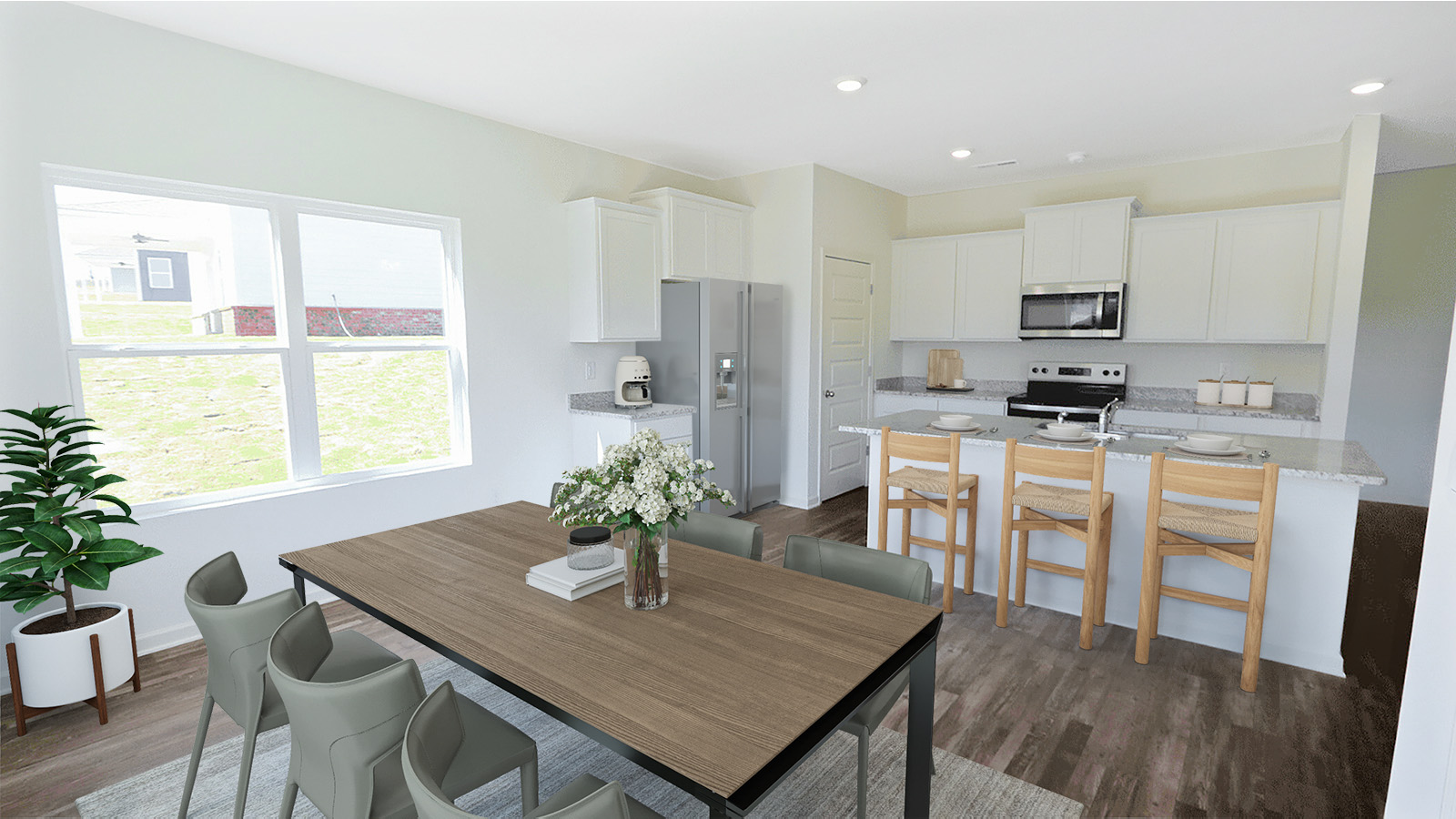 The dining area opens up into the kitchen, amking it a perfect space for entertaining.
