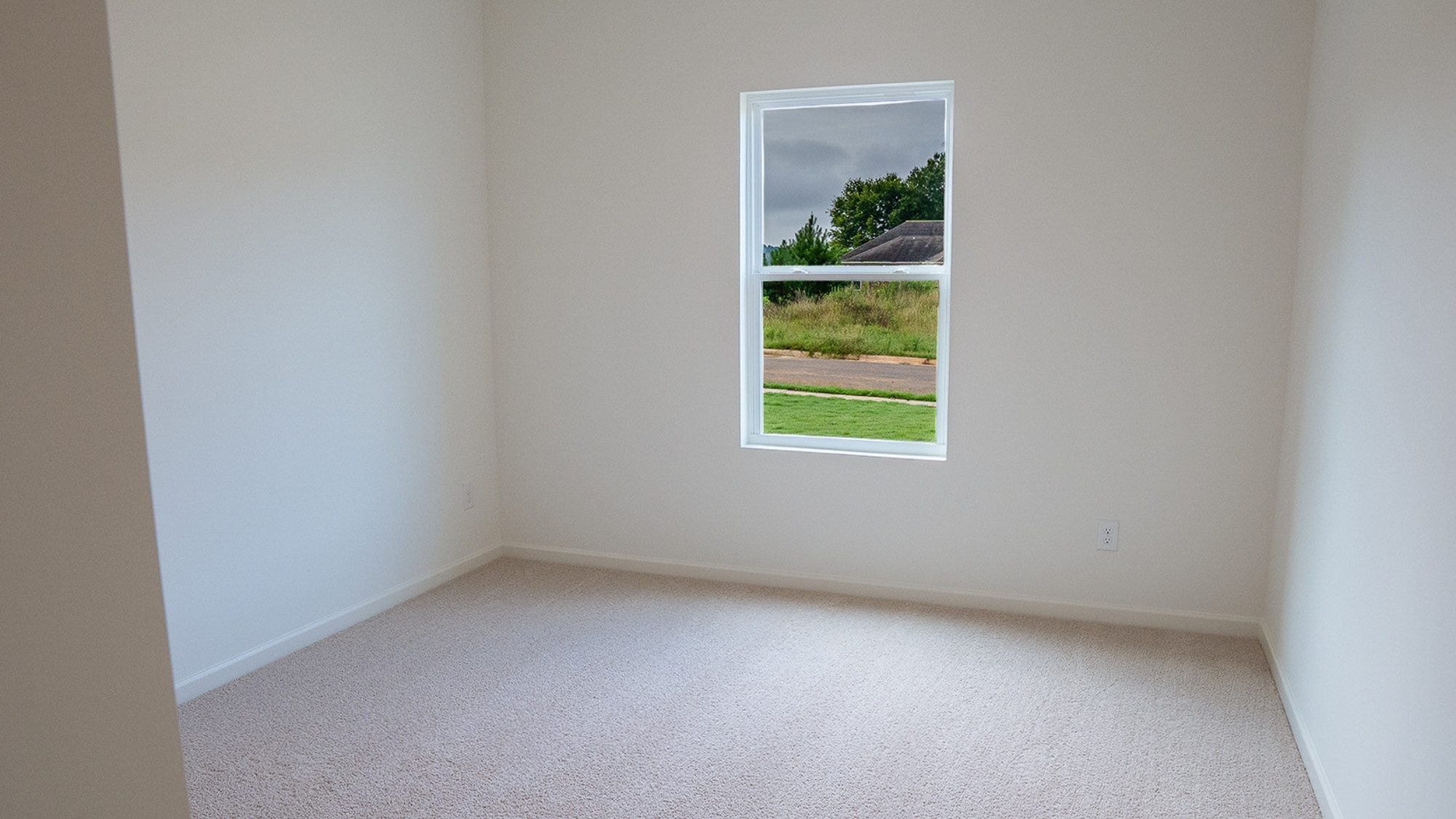 Perspective showing the transition from the main bath area into the enclosed toilet space.