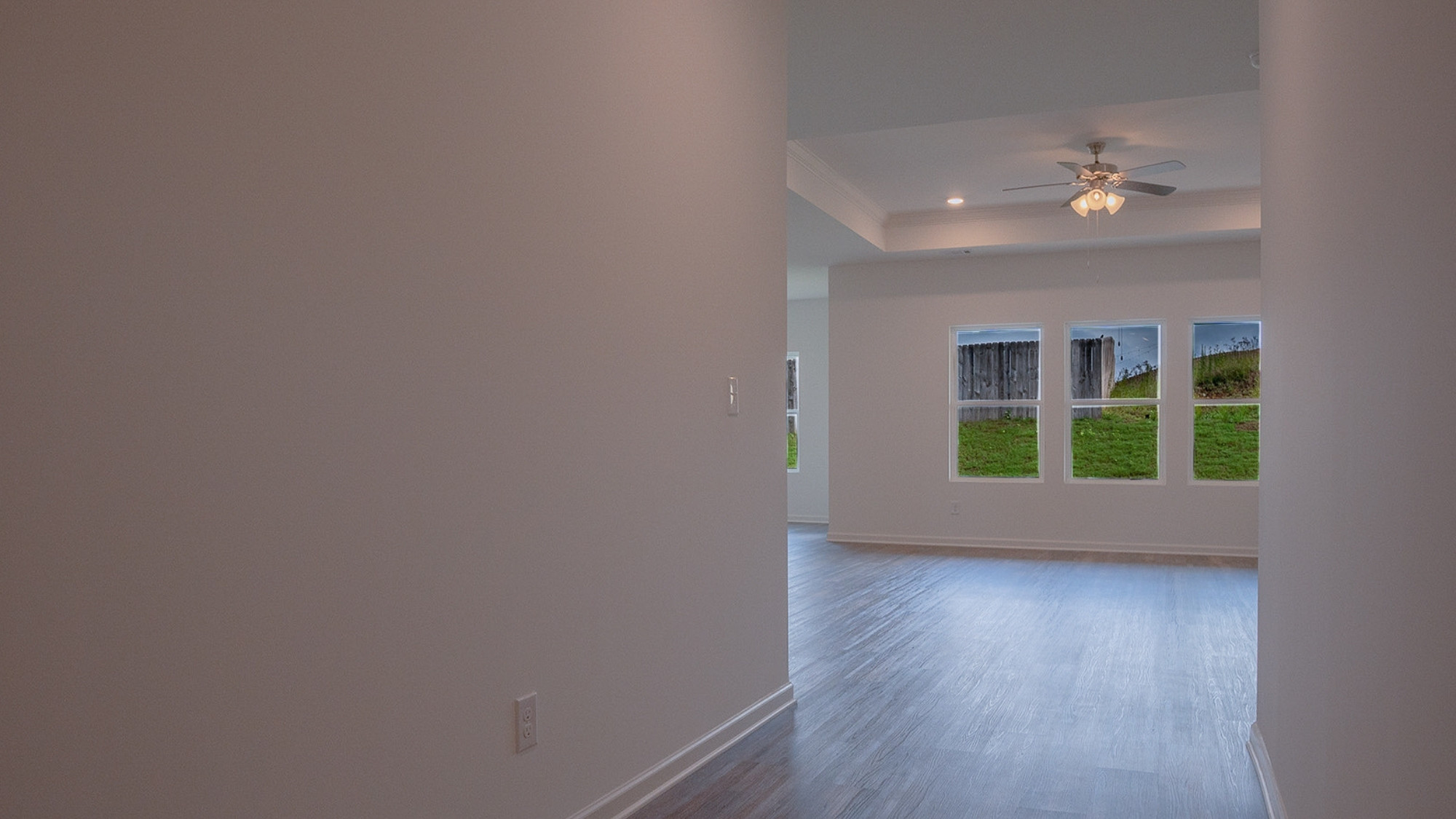 View of the double vanity with sleek cabinetry and modern fixtures, showcasing clean lines and ample counter space.