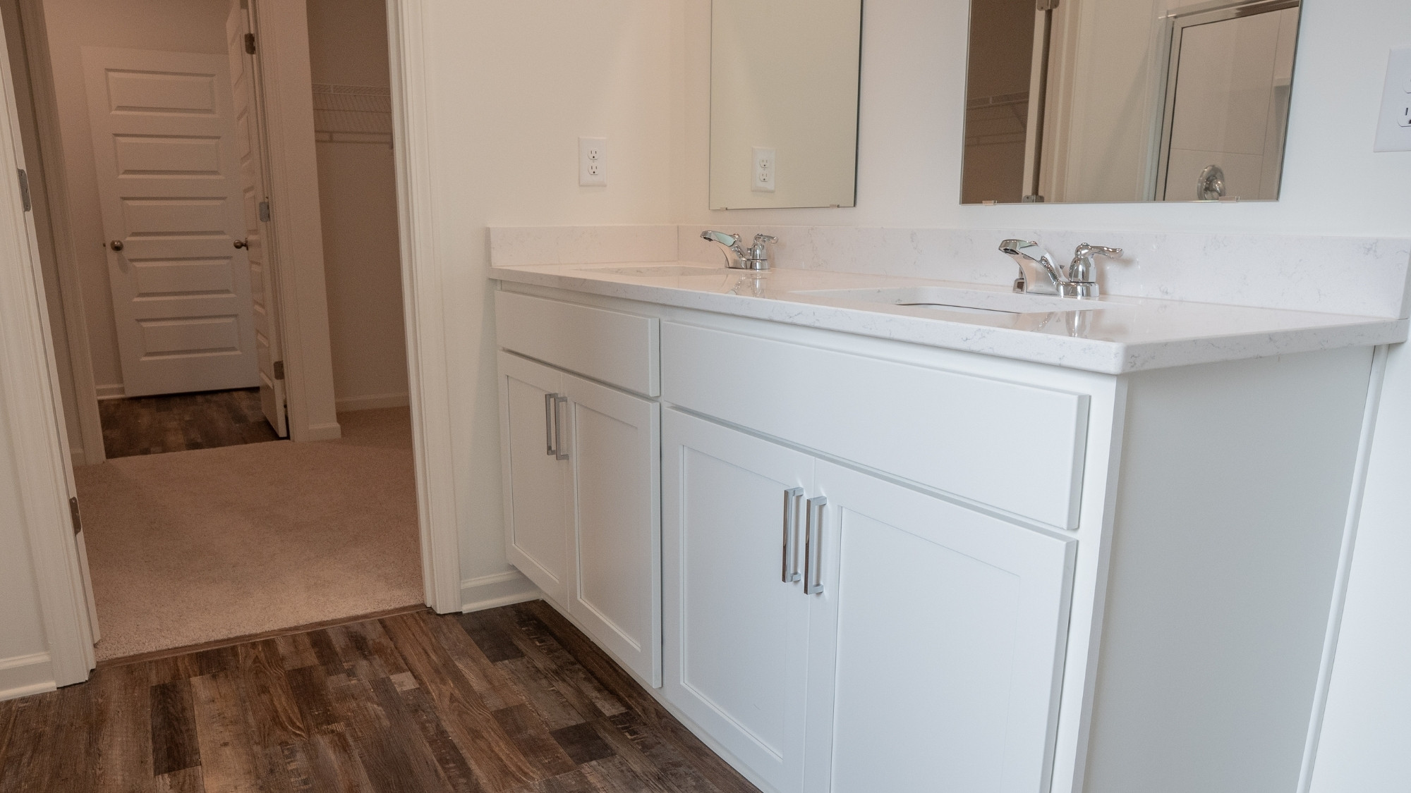 Bright and spacious bedroom retreat with clean architectural lines and a strong emphasis on natural light and openness.