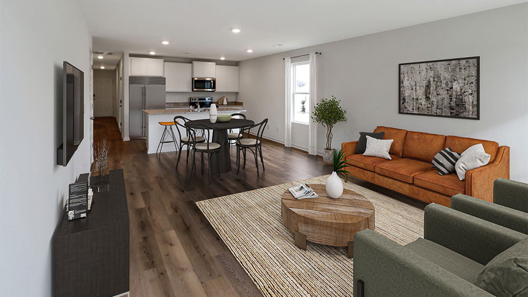 A contemporary living room featuring an open kitchen and dining area, showcasing modern furnishings and a spacious layout.   2. A stylish modern living room that seamlessly integrates a kitchen and dining area, highlighting contemporary design elements.   3. A sleek living room with an adjoining kitchen and dining space, emphasizing a modern aesthetic and open-concept layout.