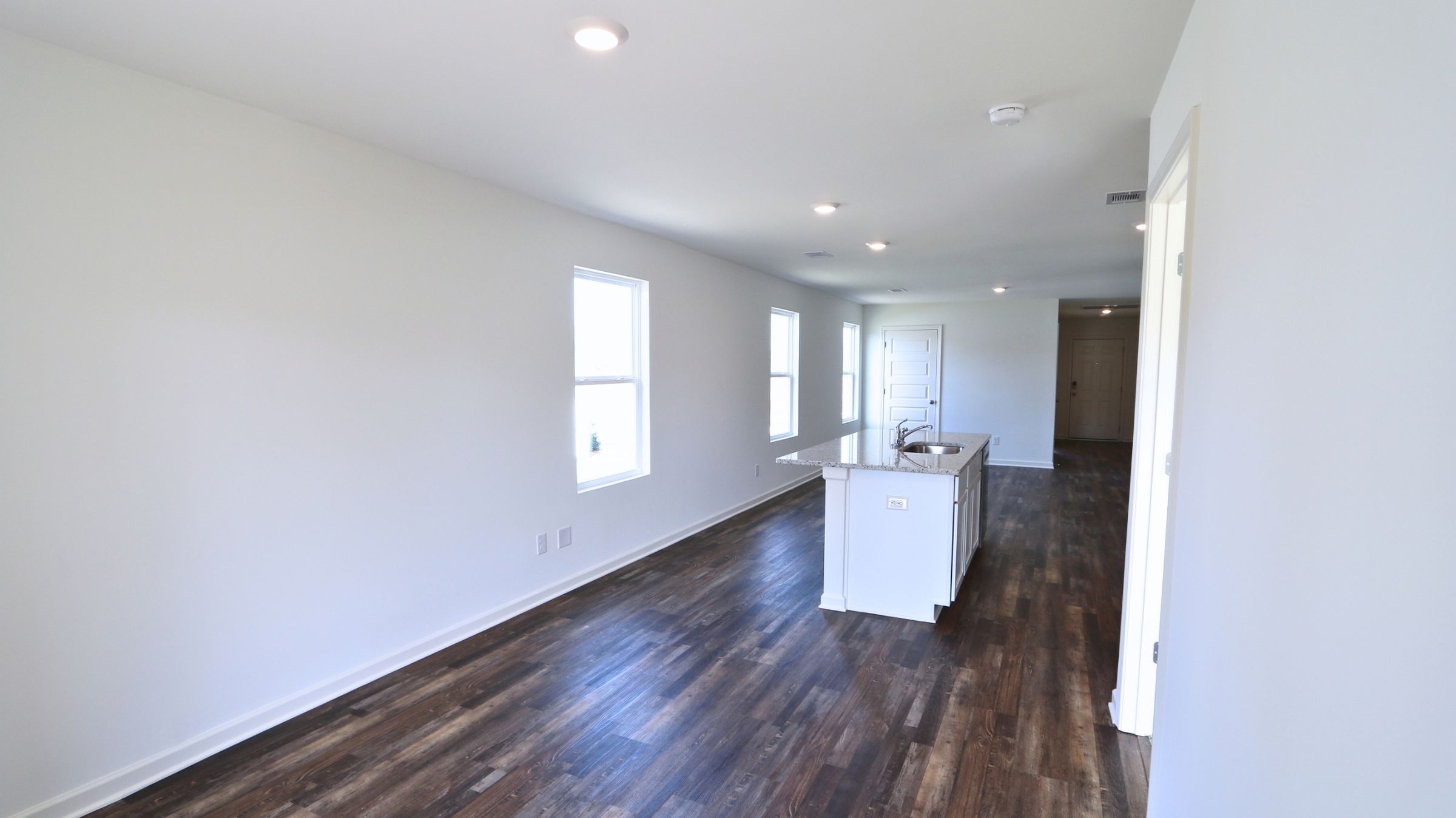 Welcome to the Ryker Plan, one of our floorplans providing new home conveniences, while hosting a comfortable and elegant open concept living. Just under 1,500 square feet, this beautiful single- story home offers 4-bedrooms with 2-bathrooms, and a 1-car garage. Met with a cozy covered porch as you enter the home, an inviting foyer, a full guest bedroom that could also serve as an office, and a hall leading to the 2nd and 3rd secondary bedrooms; with a full bathroom sandwiched in between. Each bedroom boasts plenty of space and sizeable closets for organization. Also, upon entering the home you will have immediate access to the single-car garage, storage, and your laundry room.