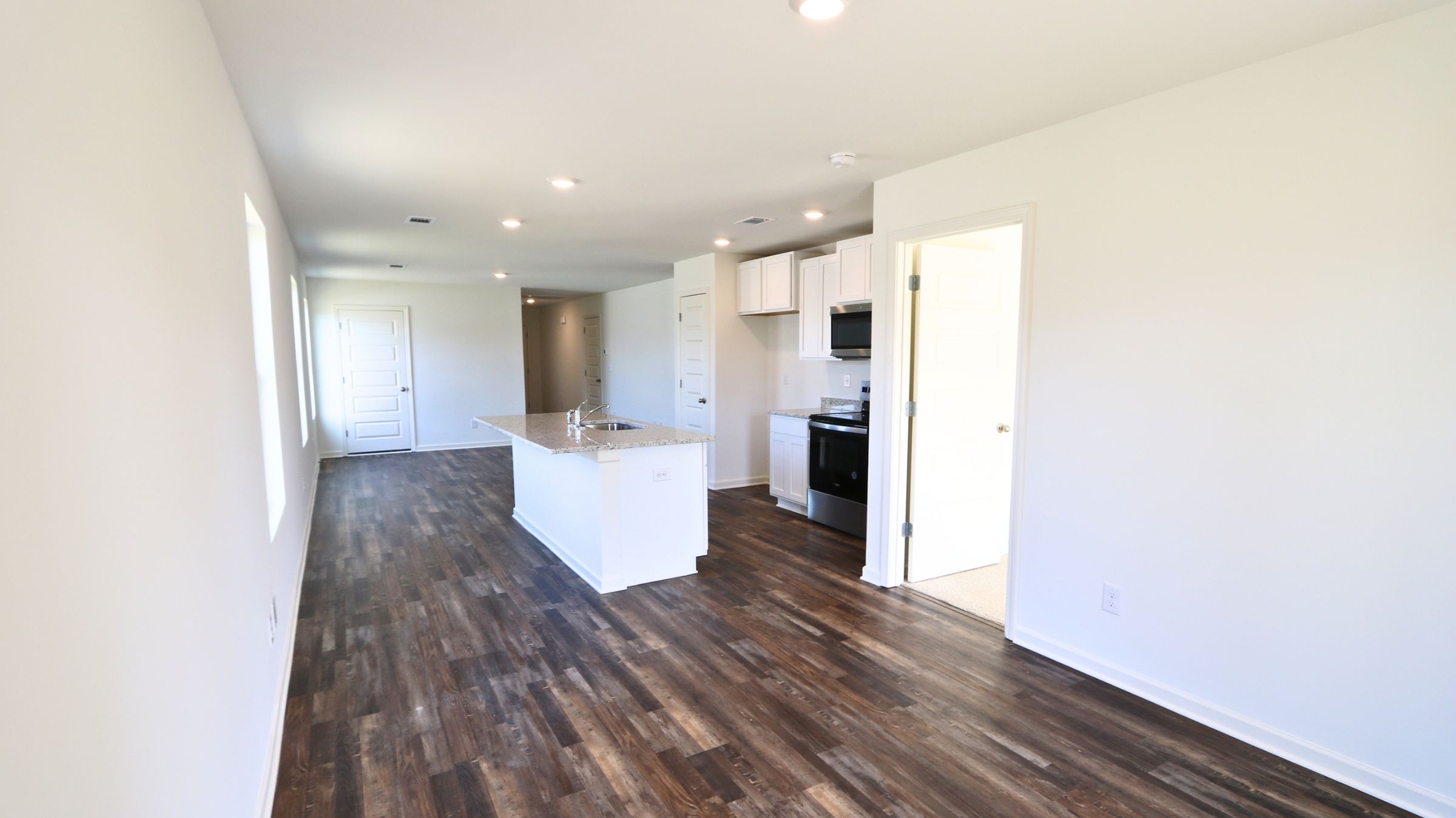 Welcome to the Ryker Plan, one of our floorplans providing new home conveniences, while hosting a comfortable and elegant open concept living. Just under 1,500 square feet, this beautiful single- story home offers 4-bedrooms with 2-bathrooms, and a 1-car garage. Met with a cozy covered porch as you enter the home, an inviting foyer, a full guest bedroom that could also serve as an office, and a hall leading to the 2nd and 3rd secondary bedrooms; with a full bathroom sandwiched in between. Each bedroom boasts plenty of space and sizeable closets for organization. Also, upon entering the home you will have immediate access to the single-car garage, storage, and your laundry room.