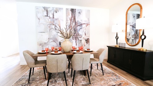 Destin – Dining Room – 1 – the formal dining area features a full-sized dining table with 4 chairs and a bench seat and opens to the kitchen