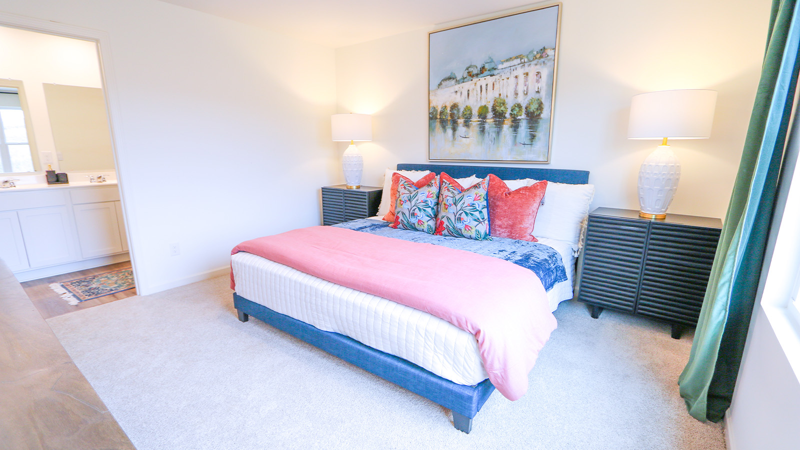The third bedroom features a bed with 2 nightstands and a dresser.