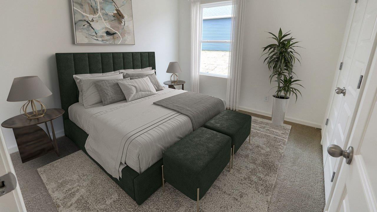 A serene bedroom featuring a green bed against crisp white walls, creating a fresh and inviting atmosphere.