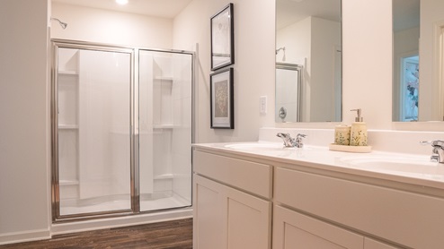 The Elston is a spacious two-story plan featuring 4 bedrooms and 2.5 bathrooms, spread across 2,305 square feet of living space. You'll love the open-concept kitchen, which boasts an oversized island for additional seating and a large pantry, connecting seamlessly to the expansive living room. On the main level, you'll find a convenient powder room, coat closet, and an additional storage closet for all your needs. Moving to the second level, Bedroom One offers a vaulted ceiling and a luxurious bathroom equipped with a walk-in shower, private water closet, double vanities, and a generously sized walk-in closet. In addition to Bedroom One, there are 3 more bedrooms, a full bathroom, a walk-in laundry room, and a loft-style living room on the second level. Throughout the home, you'll appreciate the use of quality materials and superior workmanship, showcasing meticulous attention to detail, and it all comes with a one-year builder's warranty. And that's not all - your new home also comes with our smart home technology package, adding convenience and modernity to your living space! Furthermore, every new home comes with a smart home technology package provided by D.R. Horton. This user-friendly package is tailored to provide utmost convenience, enabling easy control of essential features with a simple touch. The package includes convenient features such as lighting automation, an IQ panel, a video doorbell, keyless front door entry, and the capability to directly manage temperature settings from your smartphone. We also offer the opportunity for you to schedule a personal guided tour of the Elston plan at your convenience. Feel free to give us a call and take the first step in making The Elston your new home today!