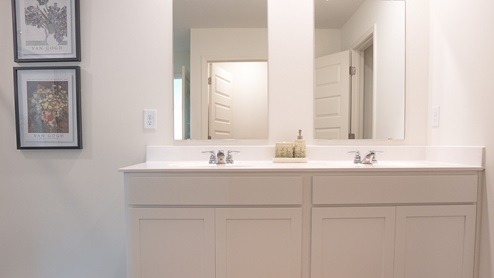 The Elston is a spacious two-story plan featuring 4 bedrooms and 2.5 bathrooms, spread across 2,305 square feet of living space. You'll love the open-concept kitchen, which boasts an oversized island for additional seating and a large pantry, connecting seamlessly to the expansive living room. On the main level, you'll find a convenient powder room, coat closet, and an additional storage closet for all your needs. Moving to the second level, Bedroom One offers a vaulted ceiling and a luxurious bathroom equipped with a walk-in shower, private water closet, double vanities, and a generously sized walk-in closet. In addition to Bedroom One, there are 3 more bedrooms, a full bathroom, a walk-in laundry room, and a loft-style living room on the second level. Throughout the home, you'll appreciate the use of quality materials and superior workmanship, showcasing meticulous attention to detail, and it all comes with a one-year builder's warranty. And that's not all - your new home also comes with our smart home technology package, adding convenience and modernity to your living space! Furthermore, every new home comes with a smart home technology package provided by D.R. Horton. This user-friendly package is tailored to provide utmost convenience, enabling easy control of essential features with a simple touch. The package includes convenient features such as lighting automation, an IQ panel, a video doorbell, keyless front door entry, and the capability to directly manage temperature settings from your smartphone. We also offer the opportunity for you to schedule a personal guided tour of the Elston plan at your convenience. Feel free to give us a call and take the first step in making The Elston your new home today!