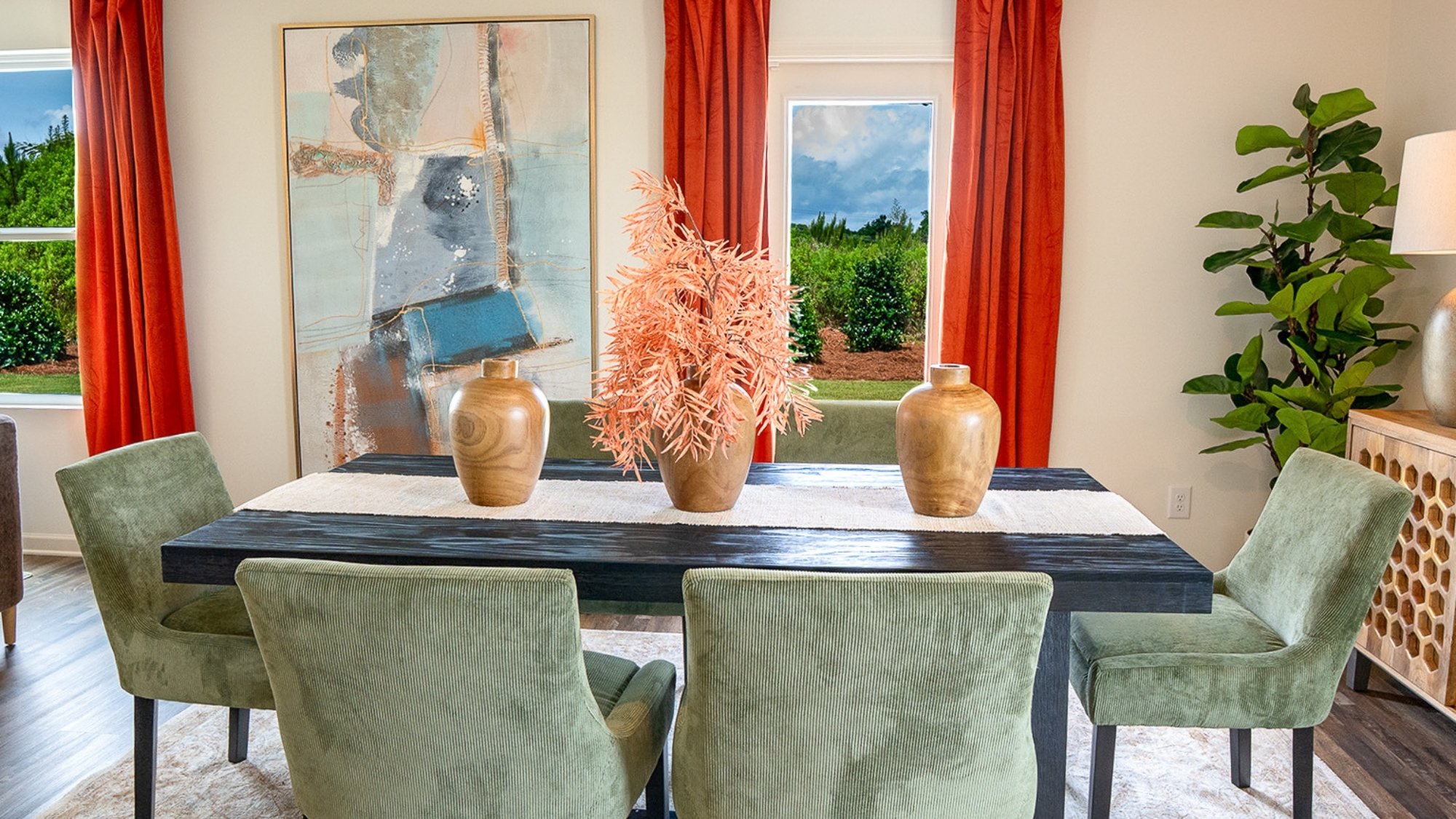 The kitchen features modern finishes and a large amount of cabinet and counter space. The eat-in island has room for the whole family to dine together.