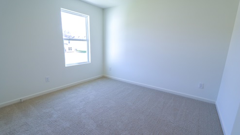 The bedrooms have more than enough room for a bedroom suite of furniture.