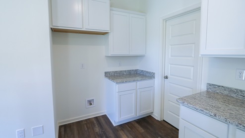 Next to the fridge is a spacious pantry.