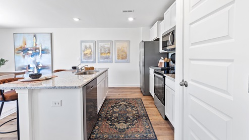 Welcome to the spacious Freeport, offering 4 bedrooms and 2 bathrooms spread across 1,497 square feet all on one level, and a two-car garage for your convenience. The chef-inspired kitchen is designed for culinary enthusiasts, featuring an oversized breakfast island, stainless steel appliances, and a pantry, all flowing seamlessly into a spacious great room for effortless entertaining. The spacious primary bedroom features a luxurious bathroom with a walk-in shower, double vanities, and an oversized walk-in closet. In addition, the other 3 bedrooms all offer generous closets, along with a laundry room, linen closet, and an outdoor patio to complete the plan. You can expect quality materials and workmanship throughout, with superior attention to detail as well as a one-year builder’s warranty. To top it off, your new home comes with a smart home technology package! Every new home at D.R. Horton comes with this smart home technology package, providing a user-friendly experience, making it easy to control essential features with a simple touch. Included in the package are convenient features such as lighting automation, an IQ panel, a video doorbell, keyless front door entry, and the ability to directly manage temperature settings from your smartphone. We also provide the opportunity for you to schedule a personal guided tour of the Freeport plan at your convenience. Feel free to give us a call and take the first step in making The Freeport your new home today!