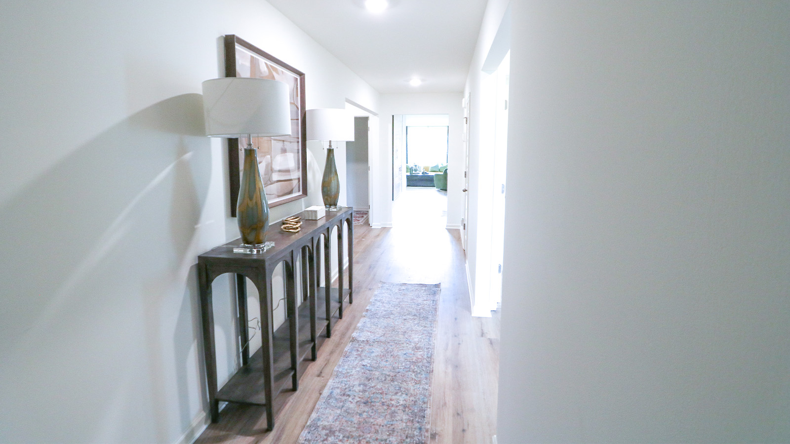 Welcome to the Cali Plan, featuring a seamless open layout just under 1,800 square feet, this beautiful single- story home offers 4-bedrooms with 2-bathrooms, and a 2-car garage.  As you enter the home, you are met with an inviting foyer with storage, a full guest bathroom, and a hall leading to the 2nd and 3rd secondary bedrooms. Further down the hall, on the opposite wall, provides access to the 2-car garage, storage, and your laundry room. Privately tucked away in this area is also the additional 4th bedroom, ideal for guest stays or a private office. Each bedroom is a generous size with a spacious closet.