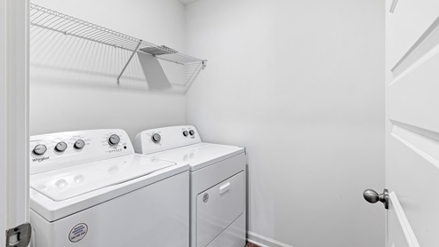 laundry area with washer and dryer