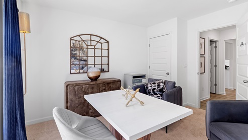The fourth bedroom is currently being used as an office. It features an oversized desk with ample space still available in the room.