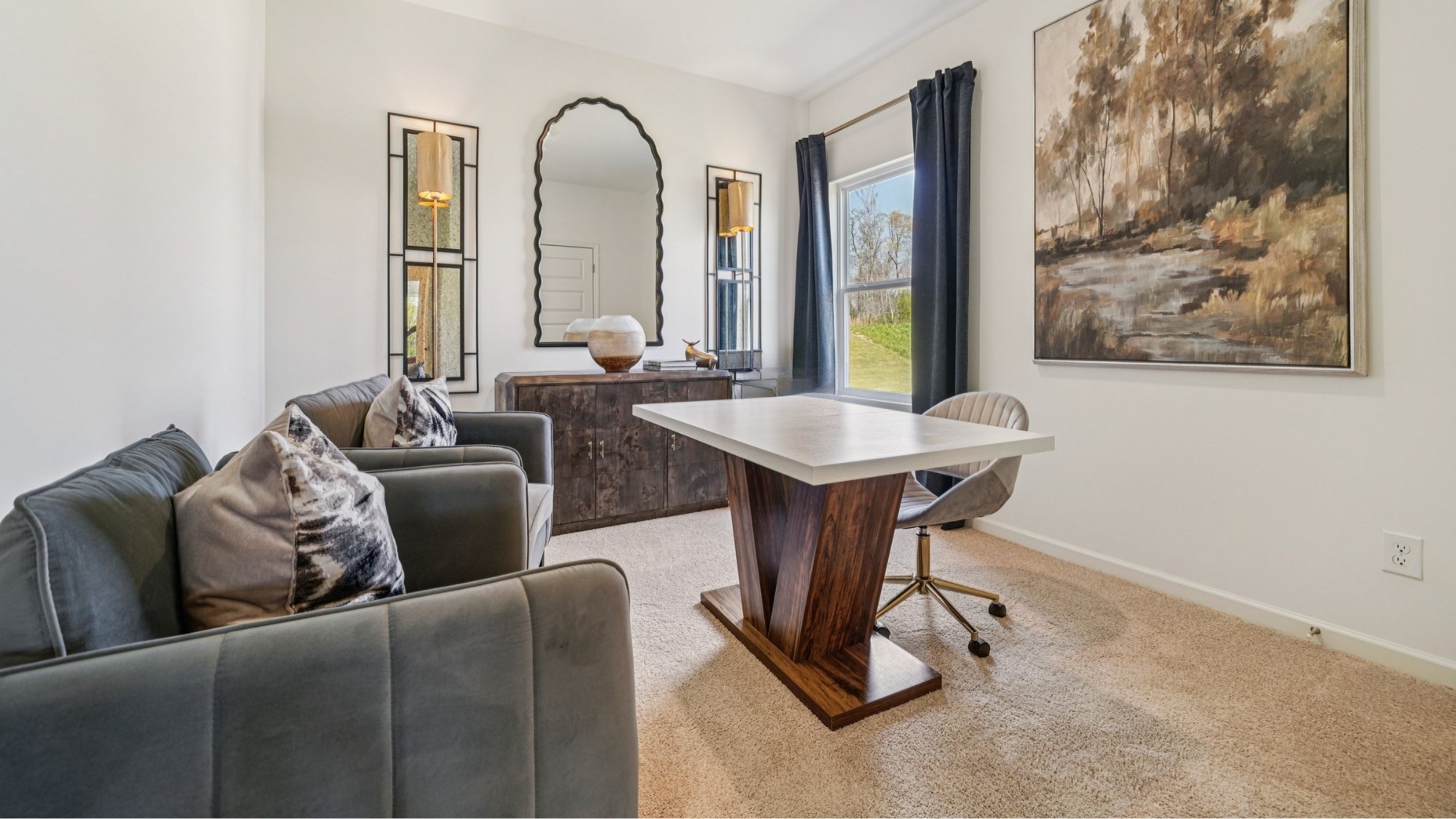 The third bedroom is staged here as a spacious home office.