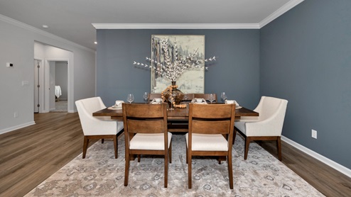 Dining room area with LVP flooring and windows