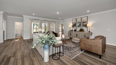 Dining room area with LVP flooring and windows