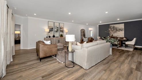 Dining room area with LVP flooring and windows