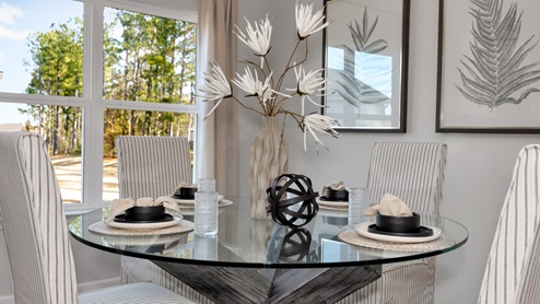 Dining room area with LVP flooring and windows