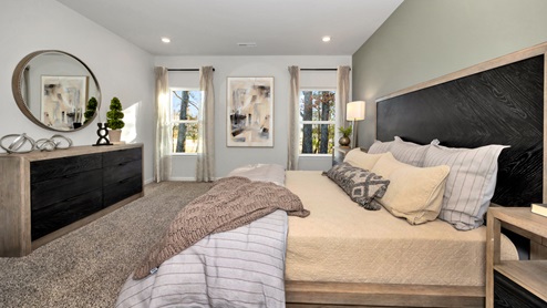 Primary bedroom with carpet