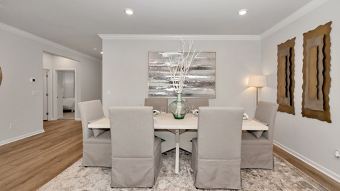 Dining room area with LVP flooring and windows
