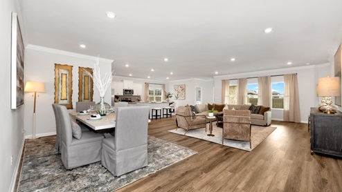 Dining room area with LVP flooring and windows