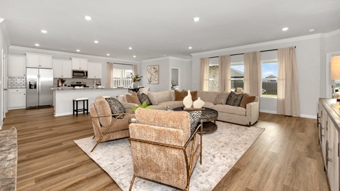 Dining room area with LVP flooring and windows