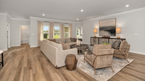 Dining room area with LVP flooring and windows