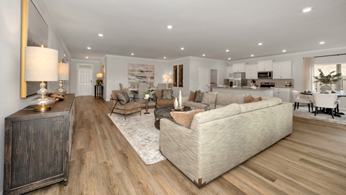 Dining room area with LVP flooring and windows