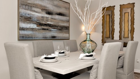 Dining room area with LVP flooring and windows