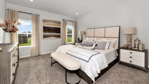 Primary bedroom with carpet