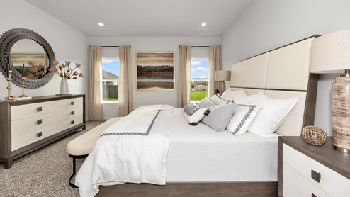 Primary bedroom with carpet