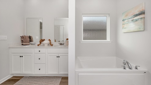 Primary bath with walk in shower and sitting tub