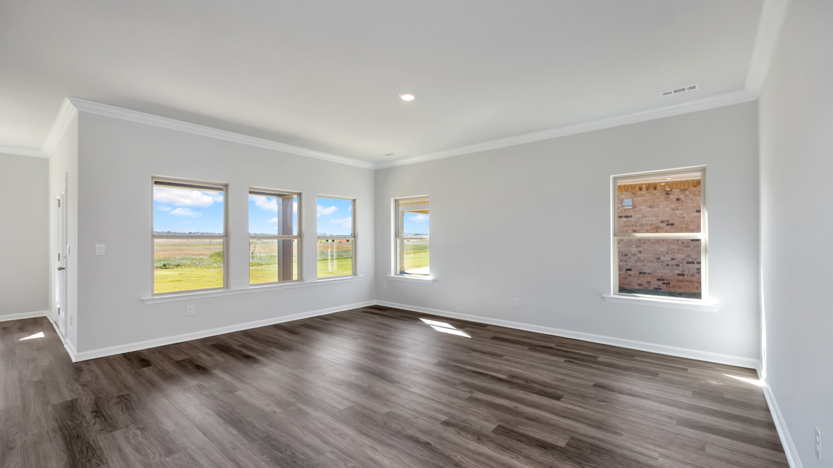 Dining room area with LVP flooring and windows