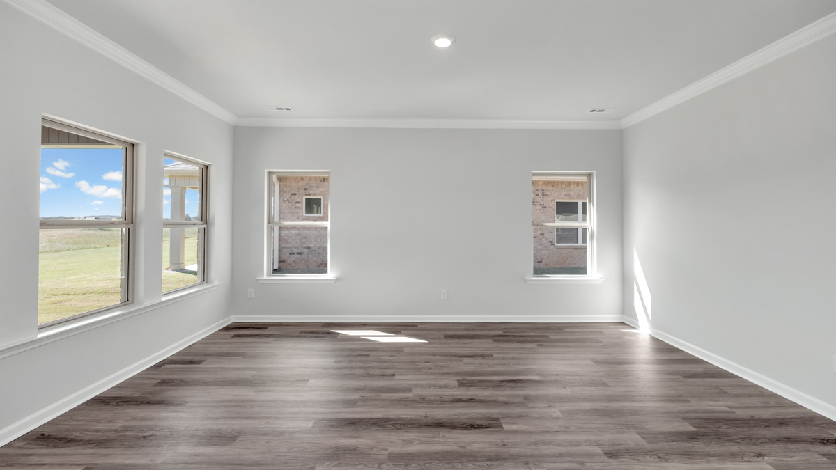 Dining room area with LVP flooring and windows