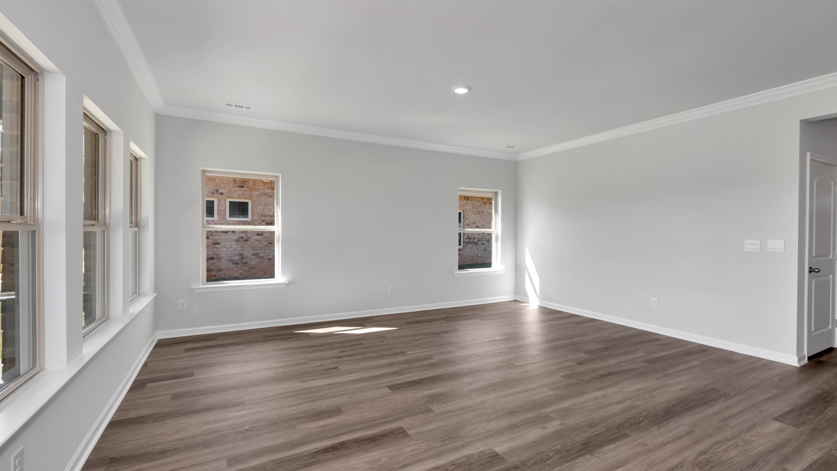 Dining room area with LVP flooring and windows