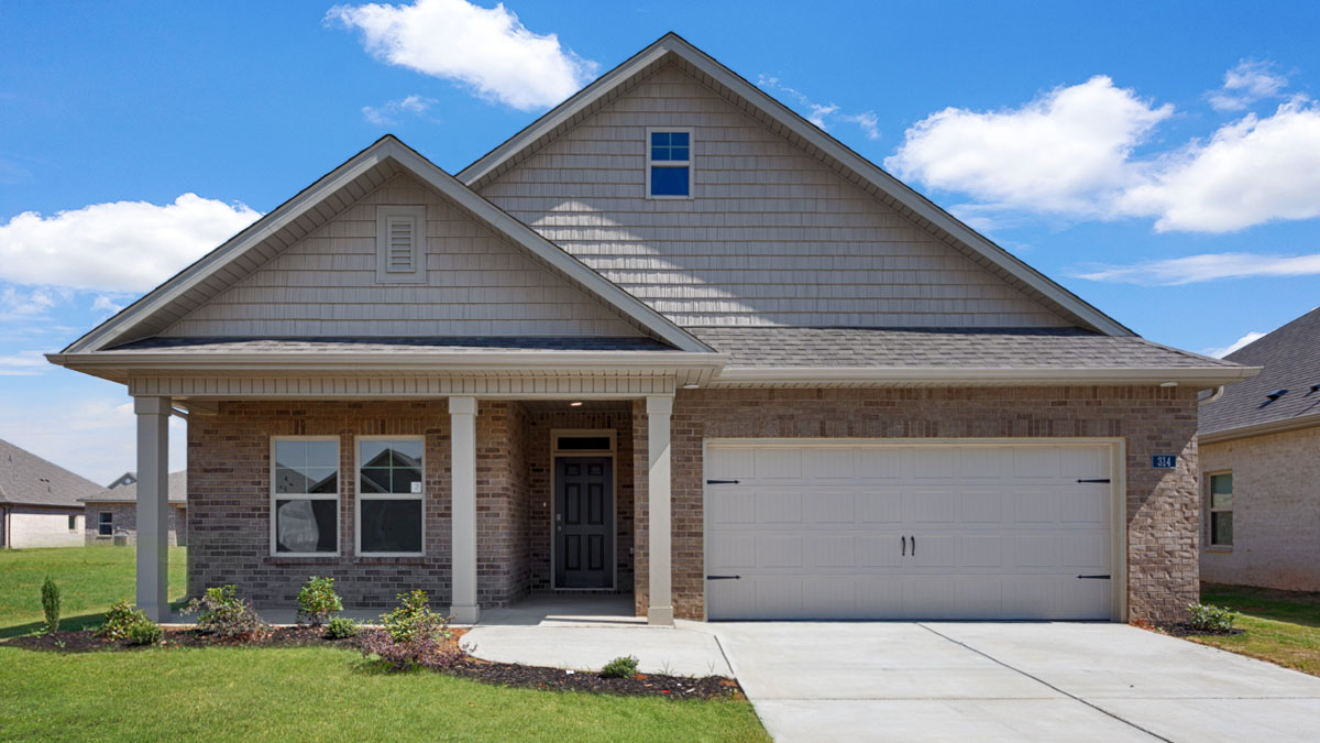 Single story home with brick and two car garage